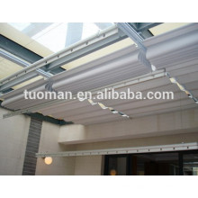 Motorised folding roof sunshade